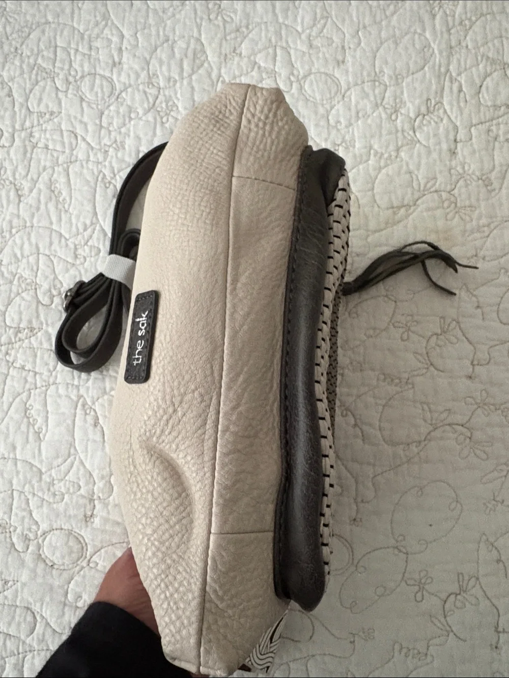 The Sak Leather Messenger Bag in Black and Cream Woven Front